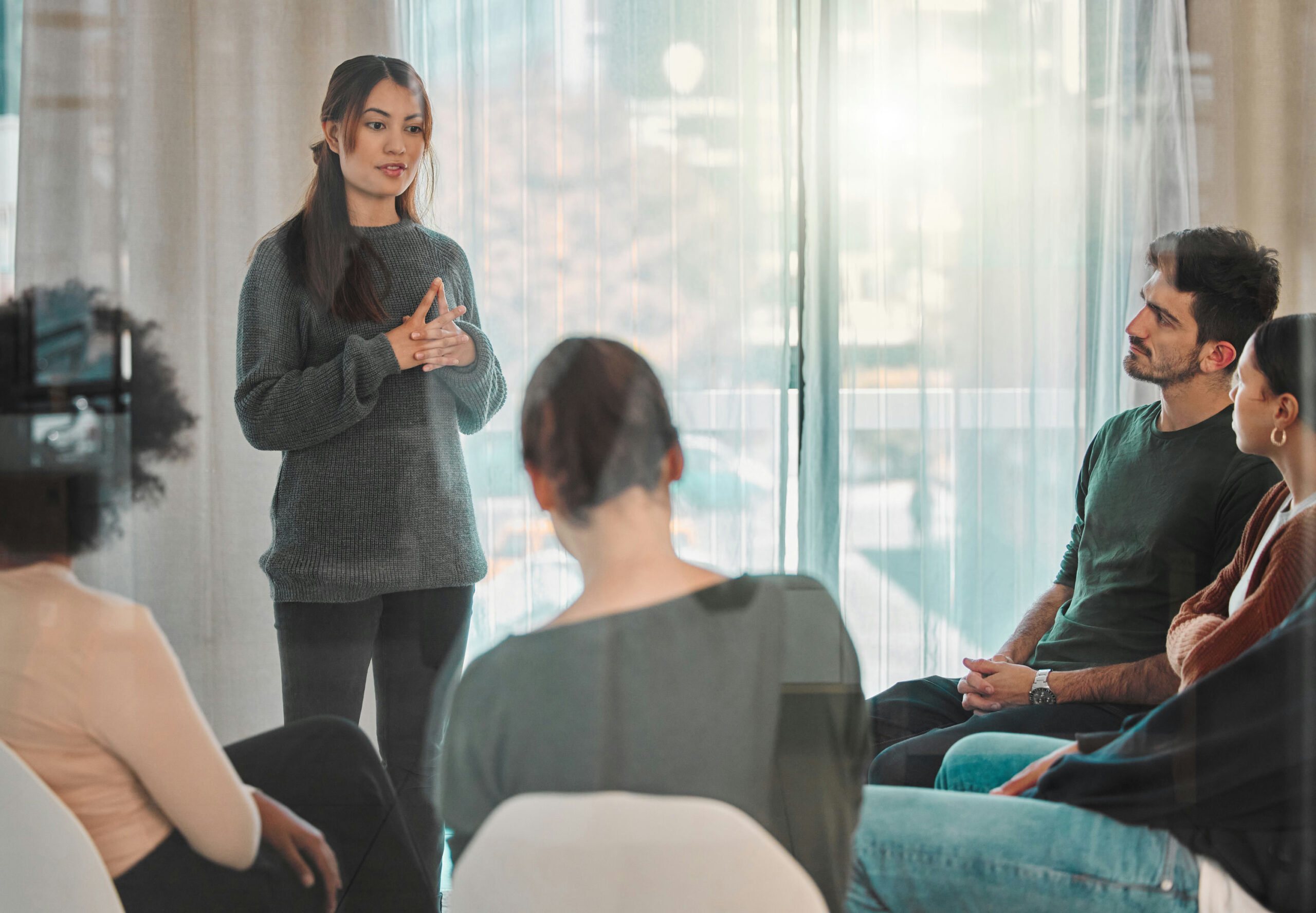 Individuals participating in group therapy to understand Xanax withdrawal and detox timeline