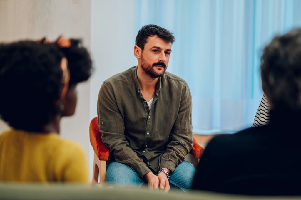 Group therapy session discussing how long Xanax detox takes and withdrawal timelines