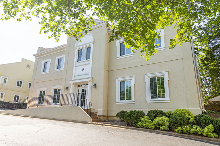 Exterior view of Carolina Outpatient Detox, offering detox services in Raleigh, NC, in a well-maintained building.
