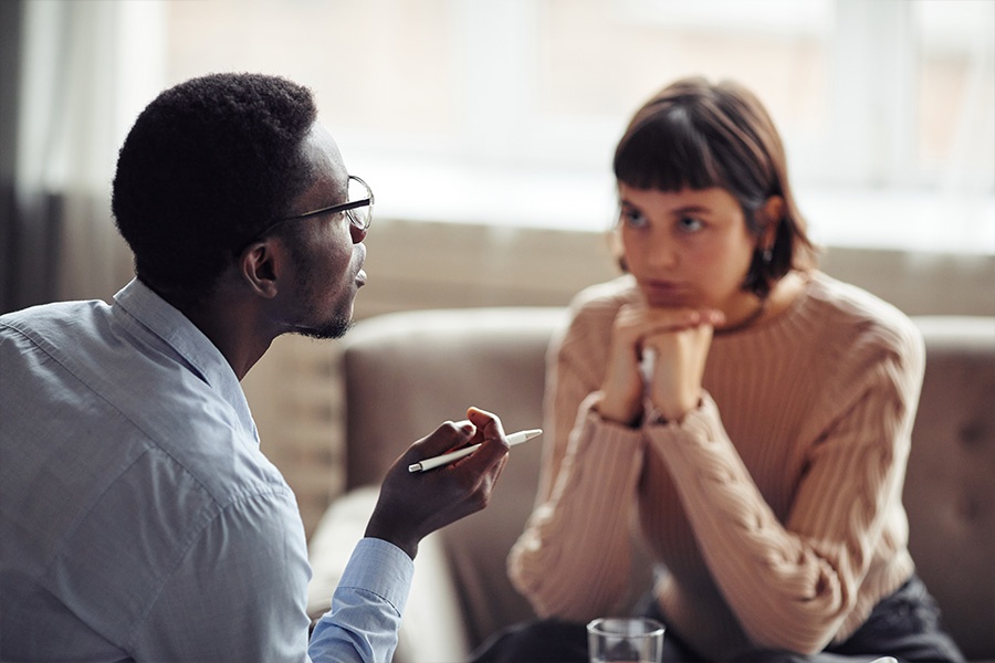 Patient consulting with a counselor about insured detox programs