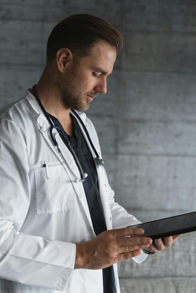 Medical professional guiding a person through the opioid withdrawal management process at an outpatient clinic