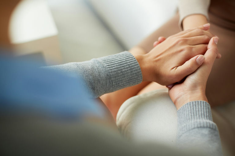 Group of supportive individuals participating in porn addiction therapy